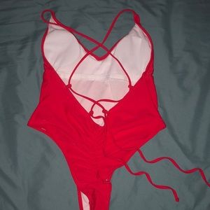 Never worn lace up ruched back one piece swimsuit